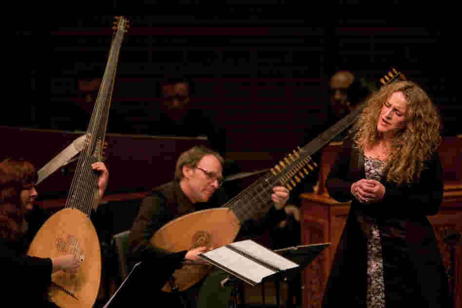 Soprano Raquel Andueza is accompanied by two Theorbos, lutes with extra long bass strings. L'Arpeggiata founder and director Christina Pluhar is on the left.
