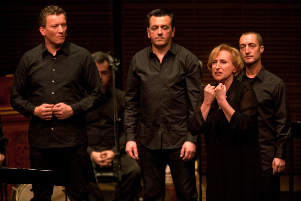 Vocalist Lucilla Galliazzi sings a passionate song with the men of Barbara Furtuna.