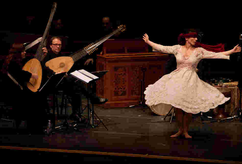 Dancer Anna Dega joined L'Arpeggiata with a blood red blindfold.