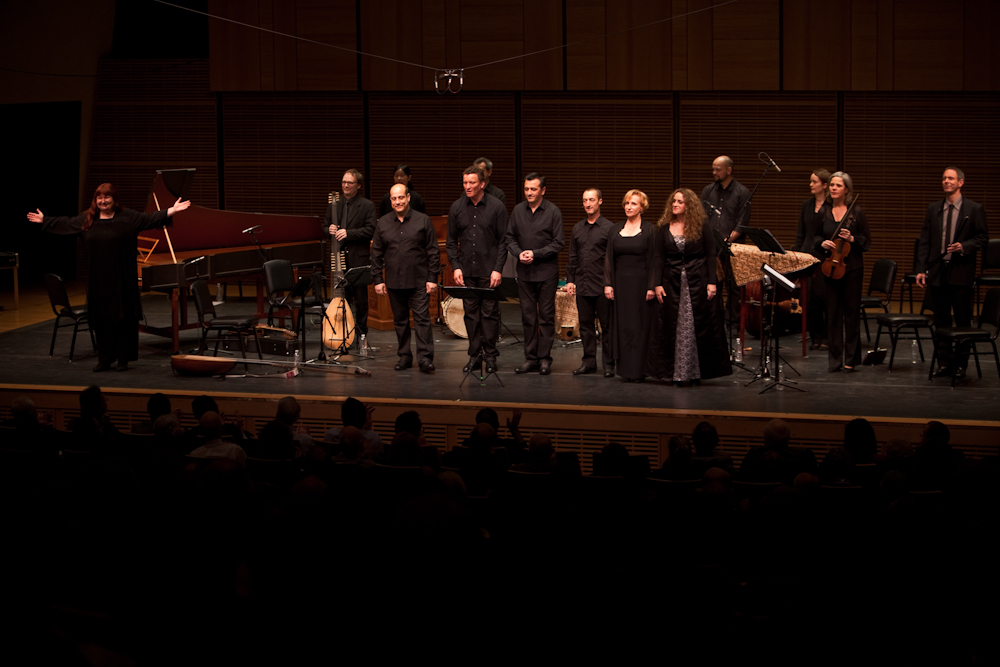 Artistic Director Christina Pluhar (far left) ready to take a final bow with her group L'Arpeggiata and guest singers after a 70-minute uninterrupted performance of "Via Crucis."