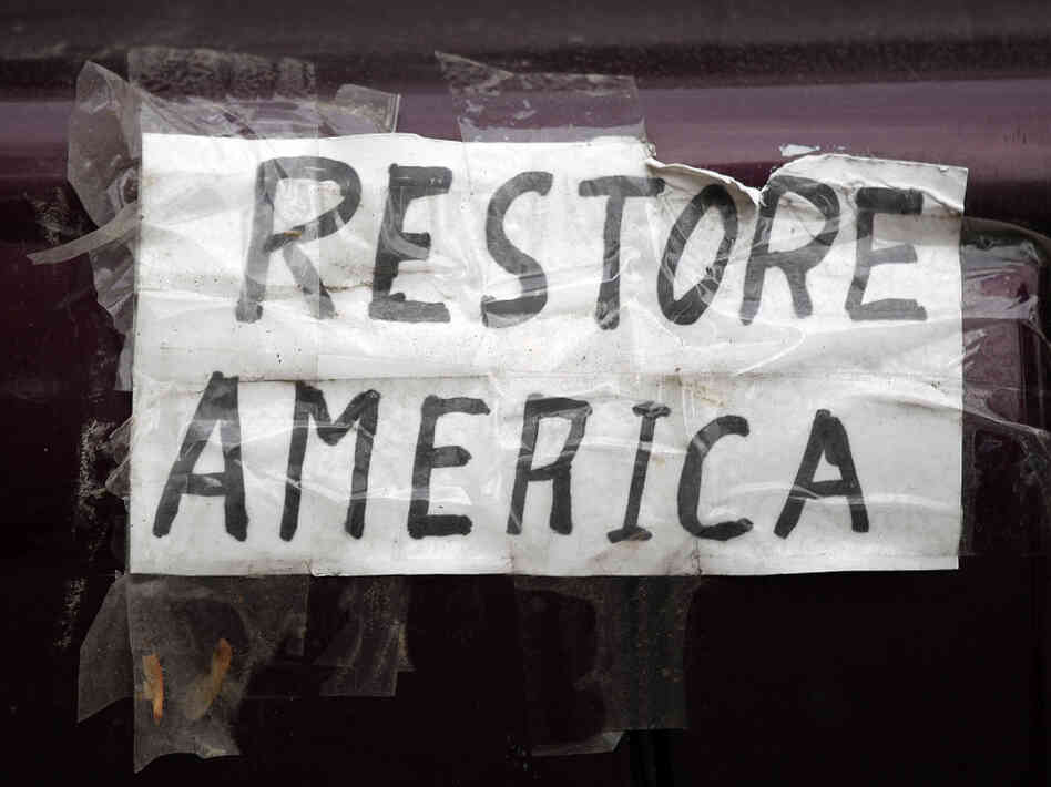 A homemade bumper sticker on the back of a car during a Tea Party rally in Concord, N.H., Romney appeared on Sept. 4.