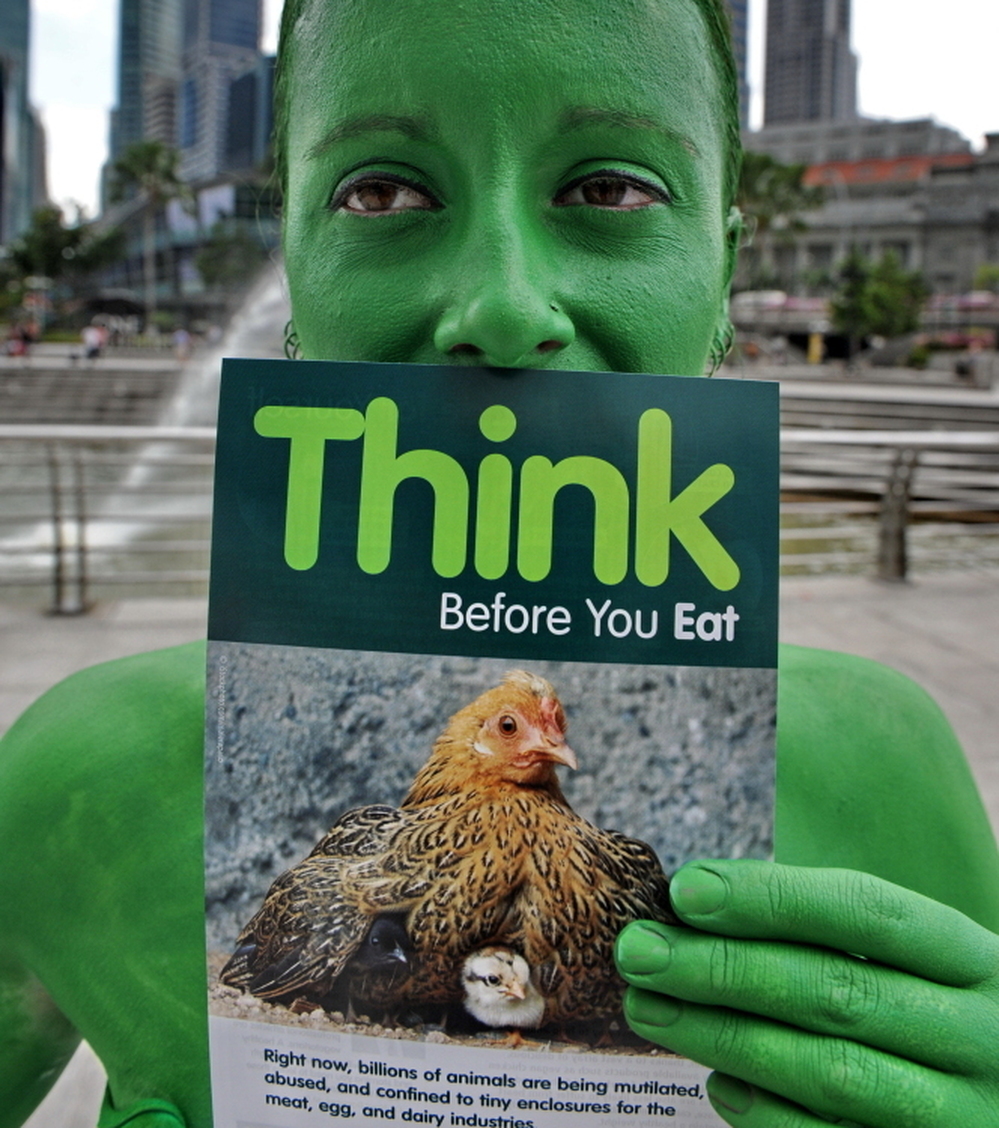Activist Ashley Fruno of People for the Ethical Treatment of Animals (PETA) campaigns in Singapore in 2011 for a switch to a vegetarian diet.