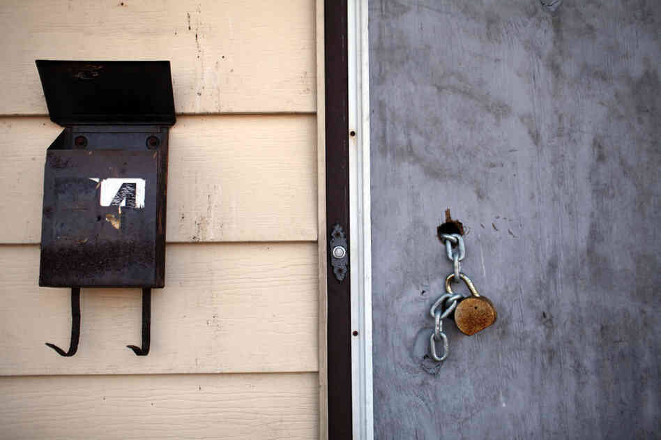 A padlock hangs from a door of a foreclosed home in Islip, N.Y. The time a foreclosure will take from start to finish varies widely from state to state. A padlock hangs from a door of a foreclosed home in Islip, N.Y. The time a foreclosure will take from start to finish varies widely from state to state.