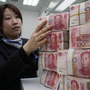 There is an advantage to strengthening the currency for people in China: It makes their imports cheaper. A clerk counts bank notes in a bank in Nantong, east China's Jiangsu Province. There is an advantage to strengthening the currency for people in China: It makes their imports cheaper. A clerk counts bank notes in a bank in Nantong, east China's Jiangsu Province.