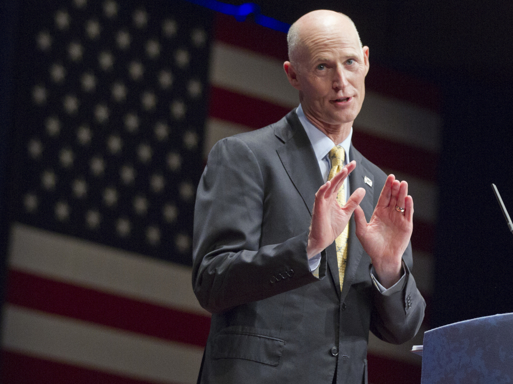 Florida's Gov. Rick Scott, seen here speaking at the Conservative Political Action Conference in Washington last month, says of Medicaid, "It is absolutely not sustainable. If we do nothing, this line will bankrupt our state."