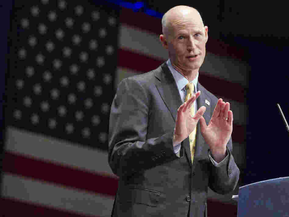 Florida's Gov. Rick Scott, seen here speaking at the Conservative Political Action Conference in Washington last month, says of Medicaid, "It is absolutely not sustainable. If we do nothing, this line will bankrupt our state."