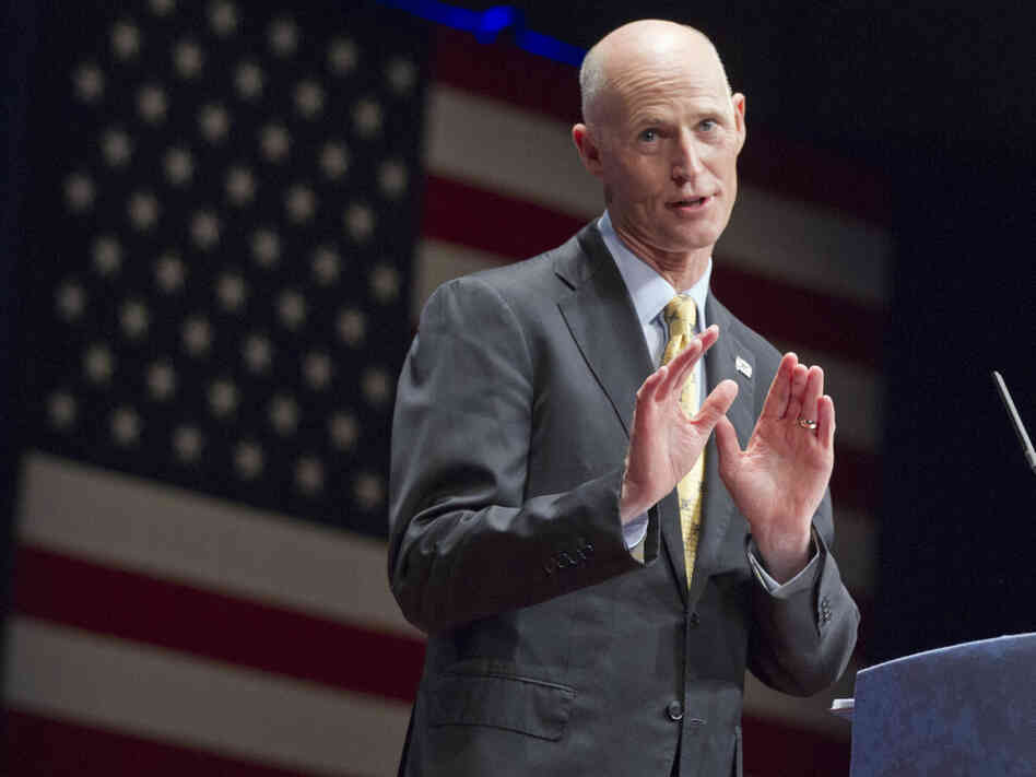 Florida's Gov. Rick Scott, seen here speaking at the Conservative Political Action Conference in Washington last month, says of Medicaid, "It is absolutely not sustainable. If we do nothing, this line will bankrupt our state."
