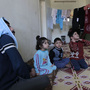 A family of Syrian refugees in a camp set up near the Jordanian city of Mafraq, near the Syrian border. Jordan has welcomed Syrian refugees, but has limited resources to help them. A family of Syrian refugees in a camp set up near the Jordanian city of Mafraq, near the Syrian border. Jordan has welcomed Syrian refugees, but has limited resources to help them.