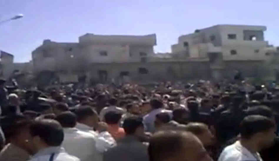 Demonstrators protest at an unidentified location, in this image grab obtained by AFPTV from YouTube on March 18. 