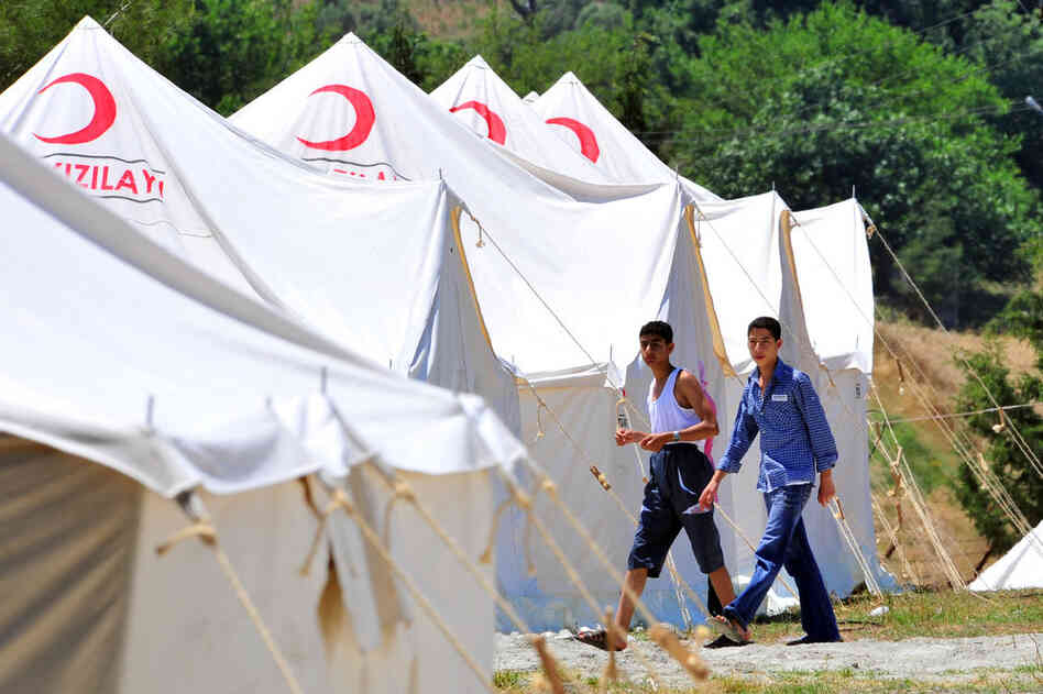 Refugees take shelter at a camp in Turkey's southern Yayladagi district on June 8. 