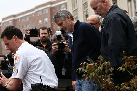 Actor George Clooney is arrested during a demonstration outside the Embassy of Sudan on Friday. Actor George Clooney is arrested during a demonstration outside the Embassy of Sudan on Friday.
