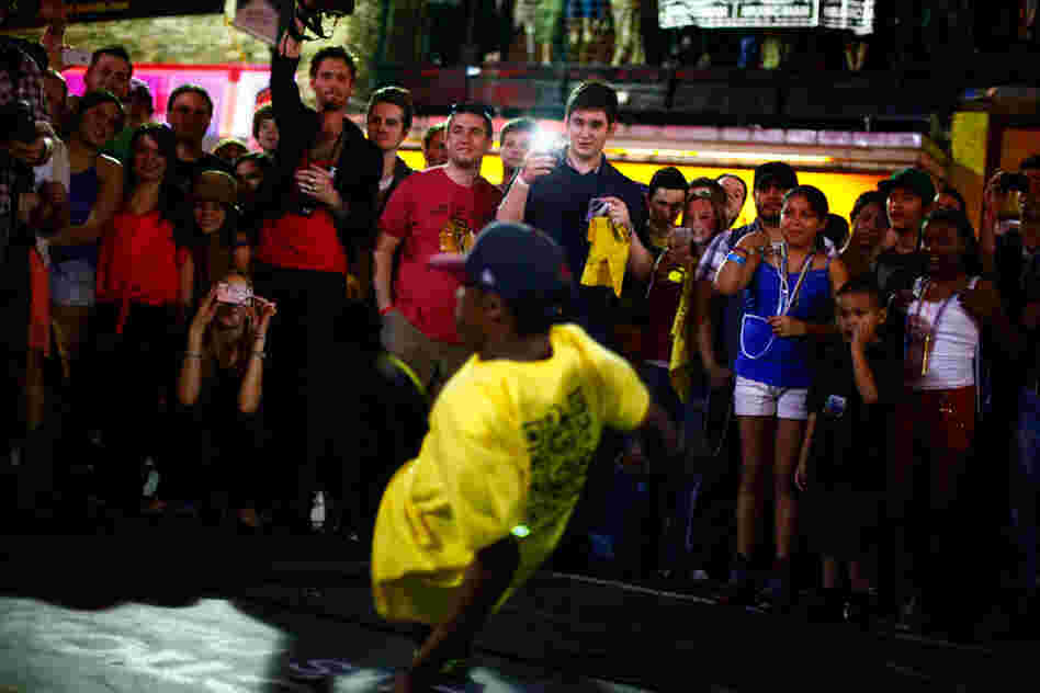 Break dancers perform on 6th Street at SXSW in Austin, Texas.