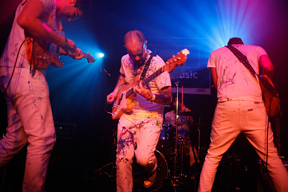 Wearing paint-splattered clothes, the Venezuelan dance-rock band La Vida Boheme kicked off NPR Music's day party at The Parish in Austin, Texas with chant-along songs and stage-shaking energy.