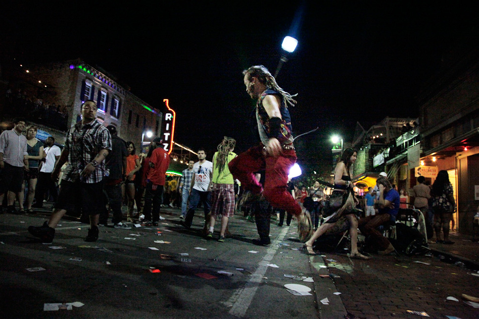 We don't really know what poi dancing is, but it makes sense that a dude in dreadlocks has taken to bright, swirling lights.