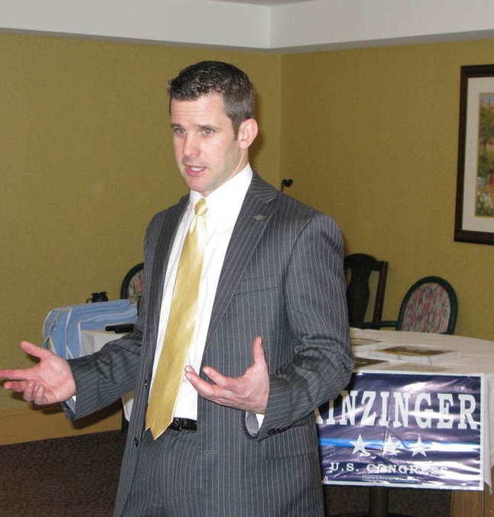 Freshman Rep. Adam Kinzinger speaks to residents and staff at the Pine Acres Rehab and Living Center in Dekalb, Ill.