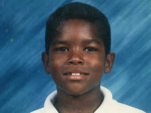 Kuntrell Jackson, 14, and two other kids held up a video rental store. One of the other boys shot and killed the cashier. Under Arkansas' felony-murder law, Jackson was deemed just as responsible as the gunman. He was tried as an adult for aggravated murder and, under state law, received a mandatory sentence of life without parole. Kuntrell Jackson, 14, and two other kids held up a video rental store. One of the other boys shot and killed the cashier. Under Arkansas' felony-murder law, Jackson was deemed just as responsible as the gunman. He was tried as an adult for aggravated murder and, under state law, received a mandatory sentence of life without parole.