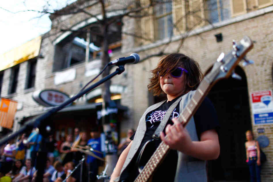 Start 'em young: Christian Brothers, from L.A., plays in the middle of the street during SXSW.