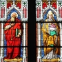 These stained glass church windows decorate the walls of the Cologne Cathedral in Germany.