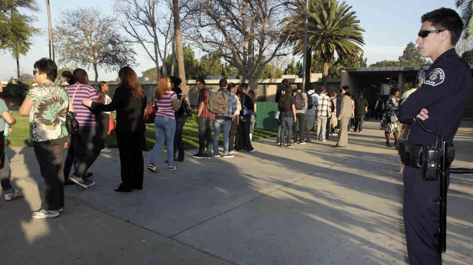 Students at Gardena High School  in Gardena, Calif., lined up for a security check before school in January 2011.