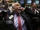 Trader Peter Tuchman reacts on the floor of the New York Stock Exchange on March 13. That same day, the Dow Jones industrial average had its highest close since 2007. Trader Peter Tuchman reacts on the floor of the New York Stock Exchange on March 13. That same day, the Dow Jones industrial average had its highest close since 2007.