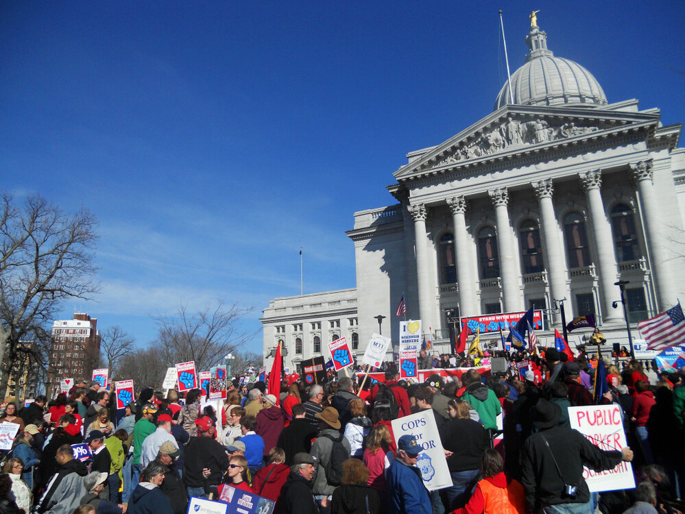 A Wisconsin GOP lawmaker facing a recall election called it quits Friday and said she hopes the state can get past scenes like this gathering of protesters in Madison on March 10, 2012. 