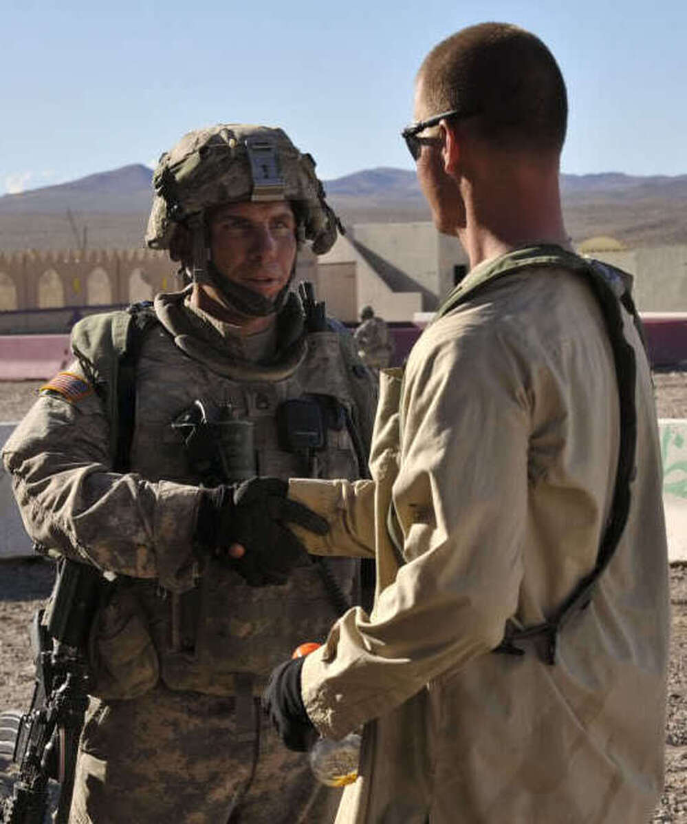 A man identified as Army Staff Sgt. Robert Bales (left) during a training exercise at the National Training Center in Fort Irwin, Calif. 