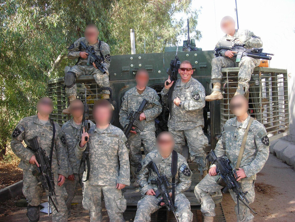 Then-Capt. Brent Clemmer said Staff Sgt. Robert Bales distinguished himself as a team leader in Clemmer's C Company, 2nd Battalion, 3rd Infantry Regiment during the Battle of Zarqa, Iraq. The faces of the rest of Bales' squad have been obscured.
