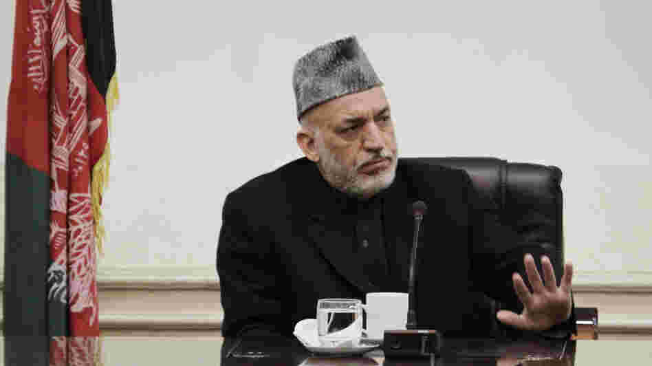 Afghan President Hamid Karzai lashed out at the United States on Friday, saying he is at the "the end of the rope" because of the lack of U.S. cooperation into a probe of a killing spree allegedly carried out by an American soldier. 