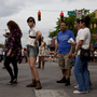 Eventual concertgoers at SXSW wait in line along 6th Street in Austin, Texas.