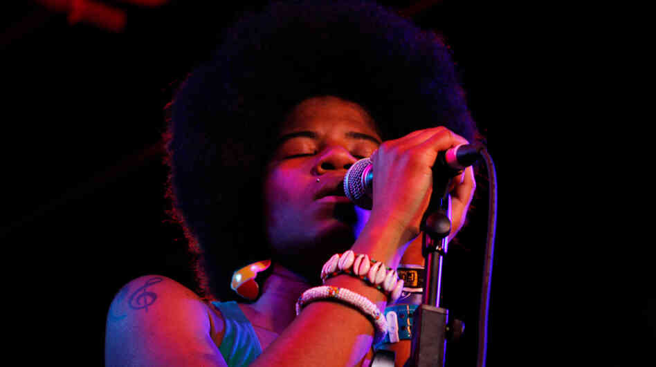 Catherine Harris-White of the hip-hop duo THEESatisfaction performs at Red 7 in Austin, Texas during the South By Southwest music conference.