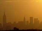 The sun sets on the Manhattan skyline in New York in September 2010. The sun sets on the Manhattan skyline in New York in September 2010.