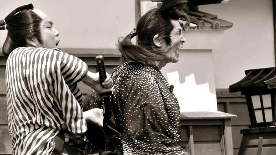 Seizo Fukumoto (right) falls to the sword of the leading man in one of Japan's chanbara or samurai films. Fukumoto is known as Japan's leading kirareyaku, or "chopped-up actor." Seizo Fukumoto (right) falls to the sword of the leading man in one of Japan's chanbara or samurai films. Fukumoto is known as Japan's leading kirareyaku, or "chopped-up actor."