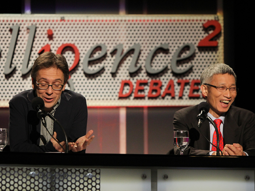 Ian Bremmer (left) and Minxin Pei argue against the motion "China Does Capitalism Better Than America."