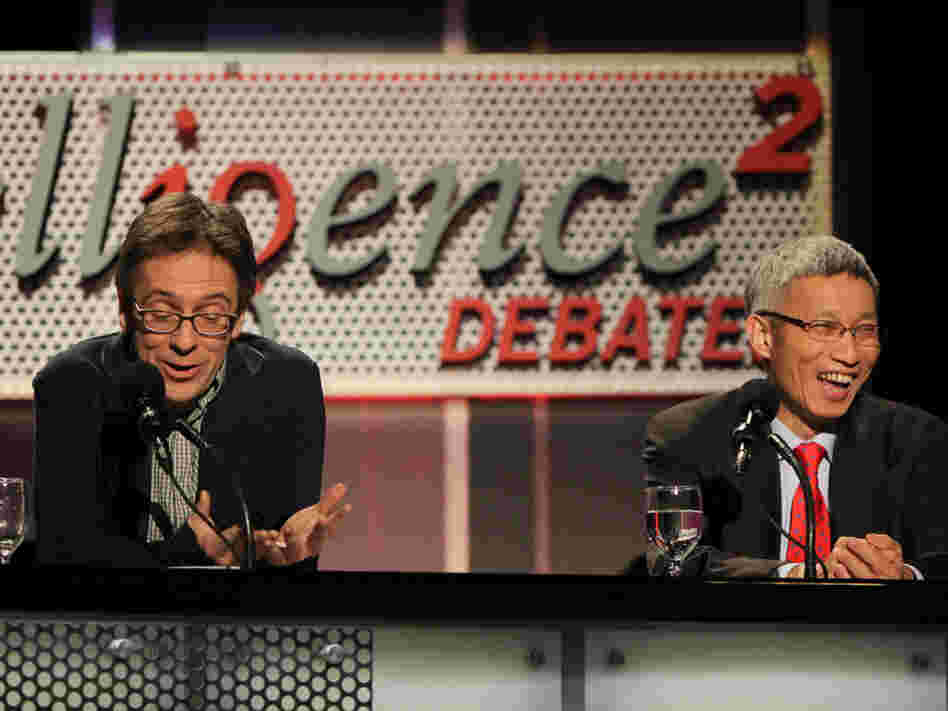 Ian Bremmer (left) and Minxin Pei argue against the motion "China Does Capitalism Better Than America."