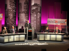 Orville Schell (from left), Peter Schiff, moderator John Donvan, Ian Bremmer and Minxin Pei speak before an audience in New York on the motion "China Does Capitalism Better Than America." Orville Schell (from left), Peter Schiff, moderator John Donvan, Ian Bremmer and Minxin Pei speak before an audience in New York on the motion "China Does Capitalism Better Than America."