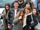 Young people walk away from the Ozar Hatorah Jewish school, on Monday in Toulouse, southwestern France, where at least four people (three of them children) were killed and one seriously wounded when a gunman opened fire. It was the third gun attack in a week by a man who fled on a motorbike. Young people walk away from the Ozar Hatorah Jewish school, on Monday in Toulouse, southwestern France, where at least four people (three of them children) were killed and one seriously wounded when a gunman opened fire. It was the third gun attack in a week by a man who fled on a motorbike.