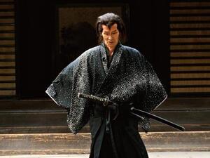 Fukumoto in one of the numerous period costume dramas he has acted in for the Toei Company's film studios since he began work there in 1959. Fukumoto in one of the numerous period costume dramas he has acted in for the Toei Company's film studios since he began work there in 1959.
