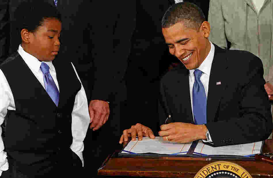 President Obama signs the Affordable Care Act in the East Room of the White House on March 23, 2010. Data suggest that racial attitudes of ordinary Americans shape both how they feel about the health care overhaul and how intense those feelings are. President Obama signs the Affordable Care Act in the East Room of the White House on March 23, 2010. Data suggest that racial attitudes of ordinary Americans shape both how they feel about the health care overhaul and how intense those feelings are.