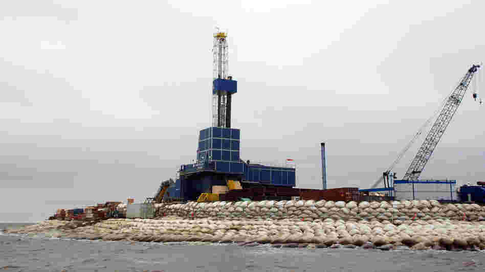 A drilling rig sits on Oooguruk Island off the coast of Alaska's North Slope. The 6-acre island was built by Pioneer Natural Resources so it could drill for oil on the Arctic Ocean. A drilling rig sits on Oooguruk Island off the coast of Alaska's North Slope. The 6-acre island was built by Pioneer Natural Resources so it could drill for oil on the Arctic Ocean.