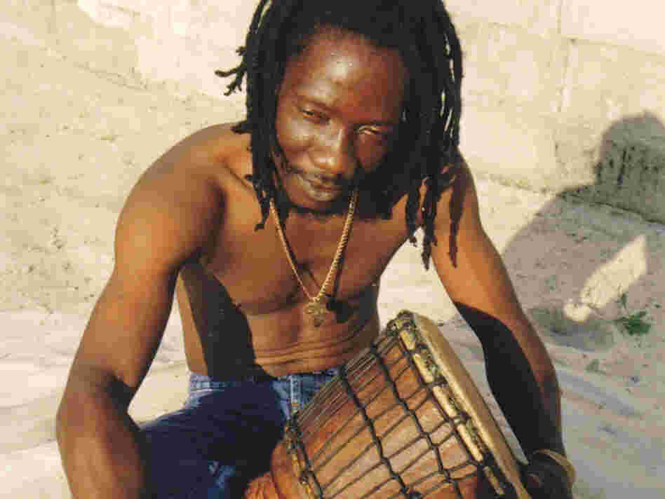 Zieti member Tiende Djos Laurent with drum. 