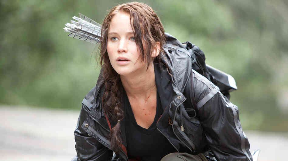 Child soldier: Hunger Games heroine Katniss Everdeen (Jennifer Lawrence) has one thing in common with real-life underage combatants in our world: an impoverished background that makes kids easy prey.