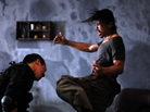 Gang enforcer Mad Dog (Yayan Ruhian, right) fights off Indonesian SWAT agent Jaka (Joe Taslim) as Jaka's team invades a Jakarta tenement controlled by a brutal gangster. Gang enforcer Mad Dog (Yayan Ruhian, right) fights off Indonesian SWAT agent Jaka (Joe Taslim) as Jaka's team invades a Jakarta tenement controlled by a brutal gangster.