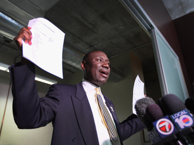 Attorney Benjamin Crump speaks to the medial, holding cellphone records and a police report. He represents the family of 17-year-old Trayvon Martin, who was was killed by neighborhood watch volunteer George Zimmerman on Feb. 26 in Sanford, Fla.