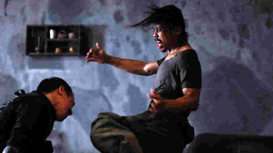 Gang enforcer Mad Dog (Yayan Ruhian, right) fights off Indonesian SWAT agent Jaka (Joe Taslim) as Jaka's team invades a Jakarta tenement controlled by a brutal gangster. Gang enforcer Mad Dog (Yayan Ruhian, right) fights off Indonesian SWAT agent Jaka (Joe Taslim) as Jaka's team invades a Jakarta tenement controlled by a brutal gangster.