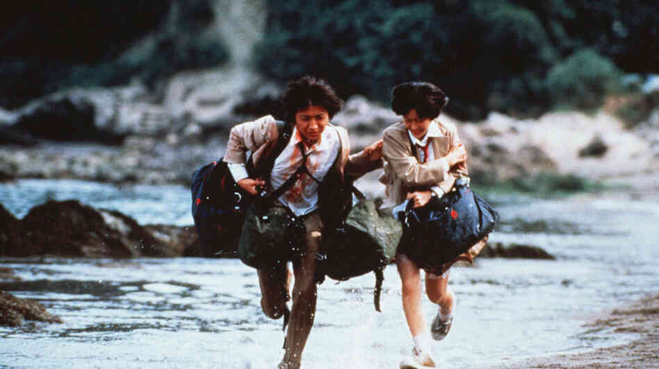 Shuya Nanahara (Tatsuya Fujiwara) and Noriko Nakagawa (Aki Maeda) are two Japanese high school students among 42 left on a deserted island, each with a bag of supplies and weapons, and forced to fight to the death in Battle Royale. Shuya Nanahara (Tatsuya Fujiwara) and Noriko Nakagawa (Aki Maeda) are two Japanese high school students among 42 left on a deserted island, each with a bag of supplies and weapons, and forced to fight to the death in Battle Royale.