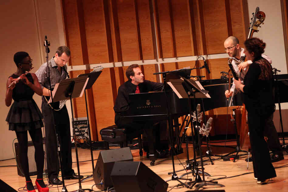 Members of the NOW Ensemble (flutist Nathalie Joachim, guitarist Mark Dancigers, Rosenfeld and Budde play Dancigers' 'Cloudbank.'.