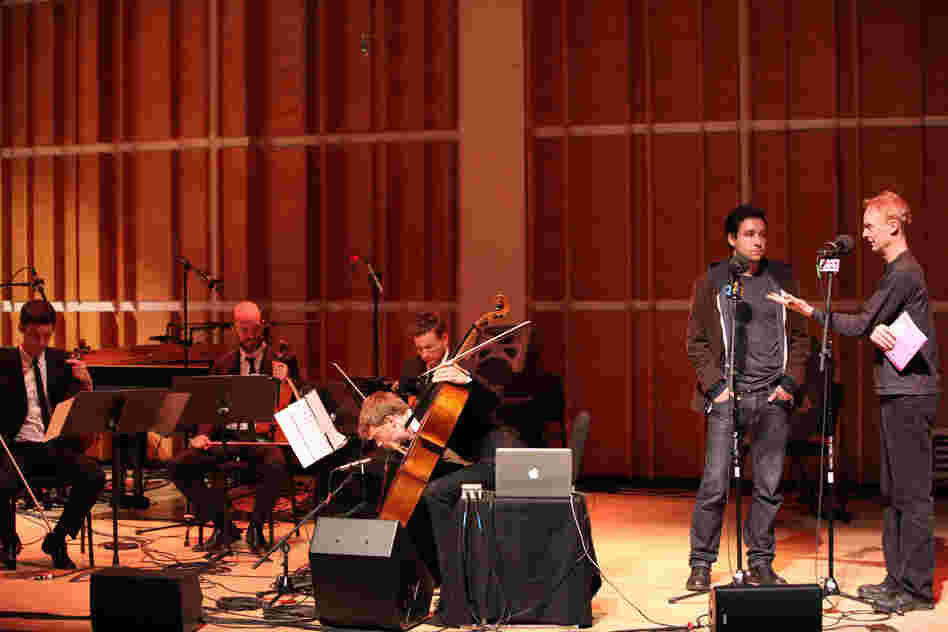 WNYC's John Schaefer, the evening's host, chats onstage with composer Daniel Wohl before the Calder Quartet plays Wohl's 2009 piece 'Glitch' for string quartet and electronics.
