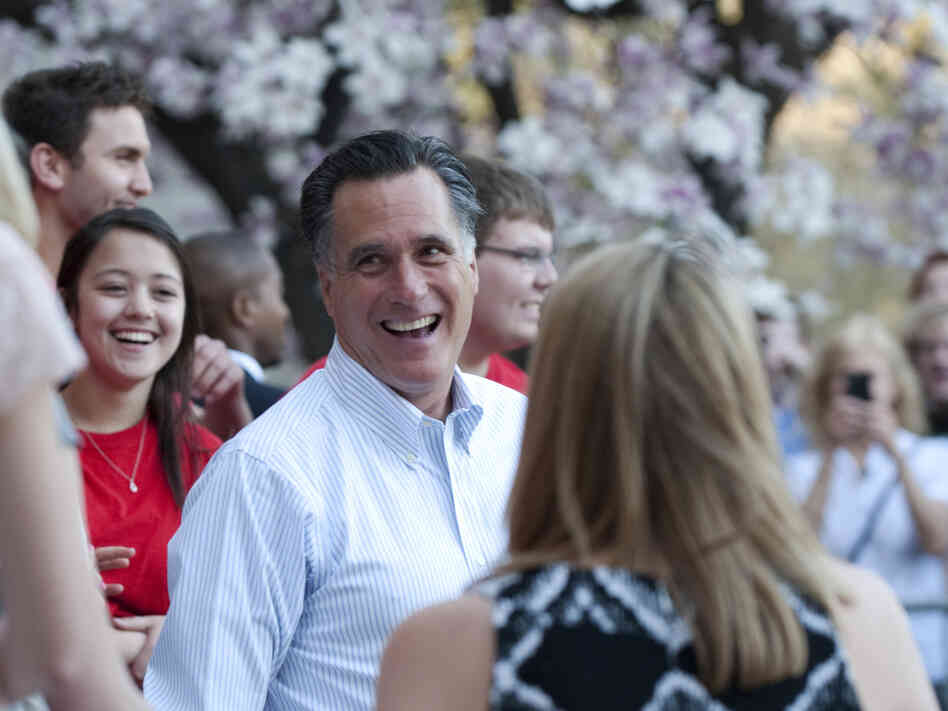 Mitt Romney talks with students March 19, 2012 at Bradley University in Peoria, Illinois. 
