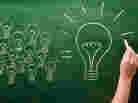 light bulbs sketched on chalkboard Many small ideas make a big one
