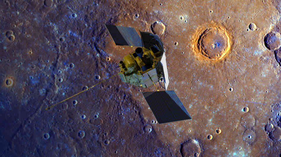 The Messenger spacecraft is depicted over the Calvino Crater on Mercury in this enhanced-color image of the planet's surface. The Messenger spacecraft is depicted over the Calvino Crater on Mercury in this enhanced-color image of the planet's surface.